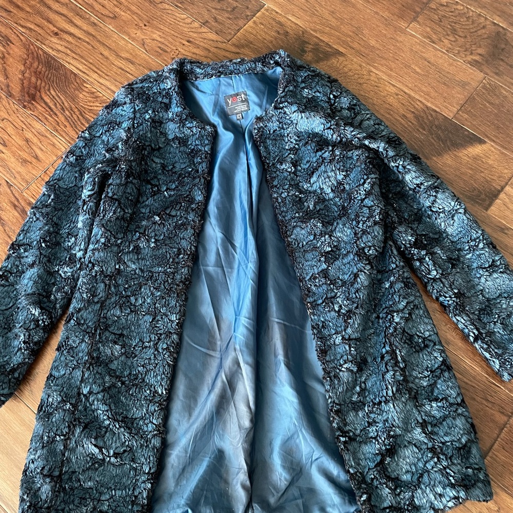 Coat, blue feathered textured soft to the touch.beautiful vibrant color.